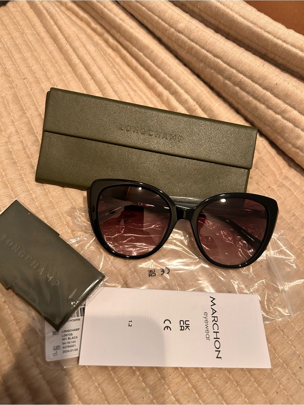 Longchamp Black Cat Eye Sunglasses with Brown Gradient Lenses